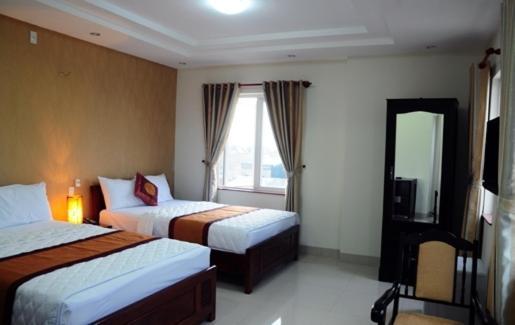 Canh Buom Hotel Da Nang Værelse billede
